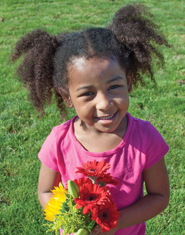 young girl with flowers